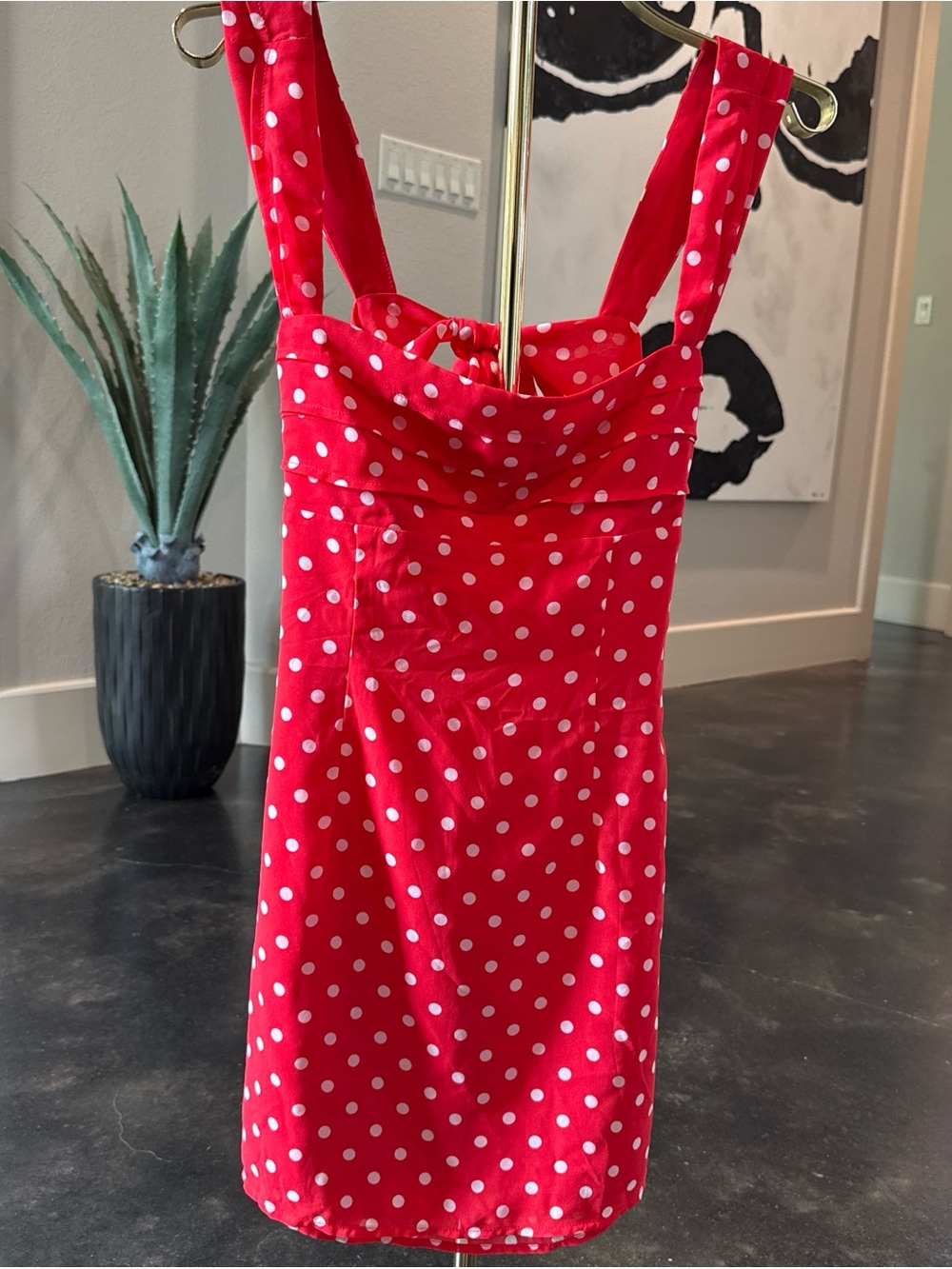 Beginning Boutique red and white polka dot dress with bow detain in the back
